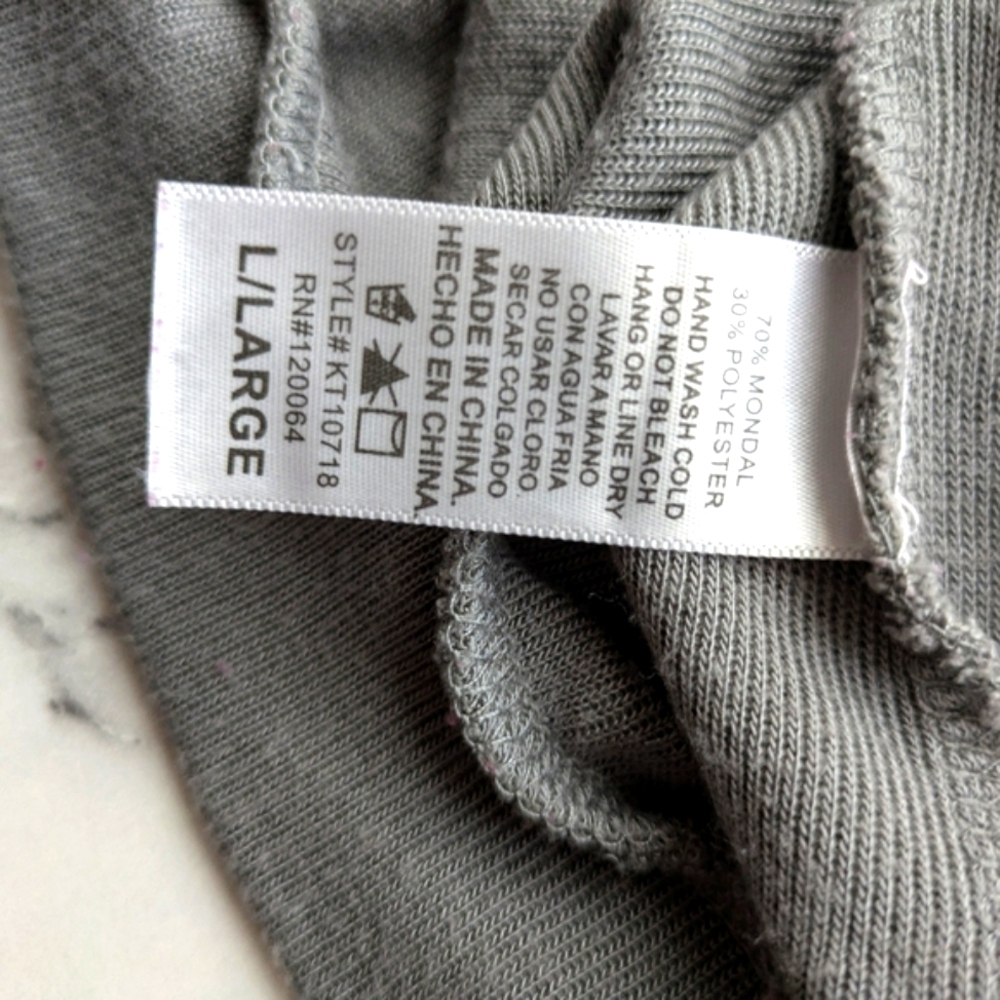 Gray Peekaboo Shoulder Ruffle Top. - Picture 3 of 3